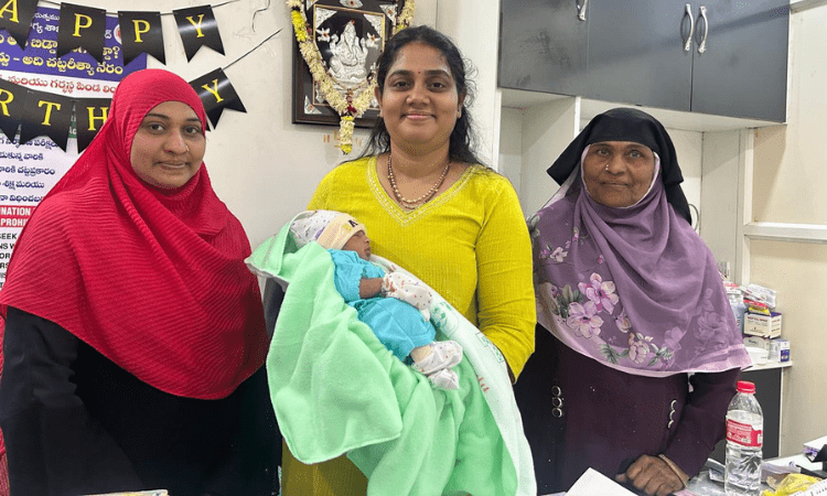 Doctor holding a baby